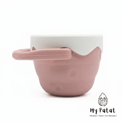 Dusty pink silicone snack cup with white lid