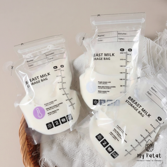 Breast milk storage bags in basket with white waffle cloth