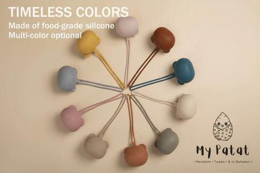10 silicone bear soother holders in multiple pastel colours arranged in a circle