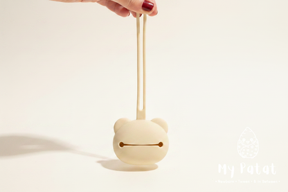 Back view of silicone bear soother holder with soft white background and My Patat Shop logo